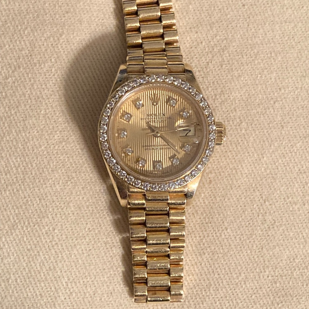 Women’s 18k Gold Rolex Presidential with Diamond Bezel